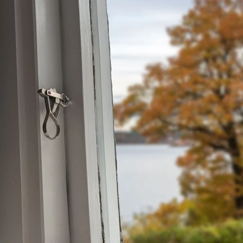 Äldre kopplat träfönster i villa – Klintens Glas uppgraderar glaset